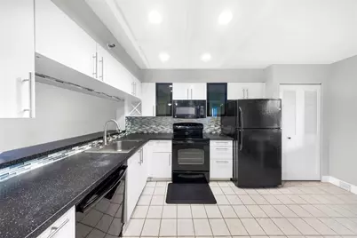 2202 S Cypress Bend Drive #207, Pompano Beach, FL 33069 - Photo 1