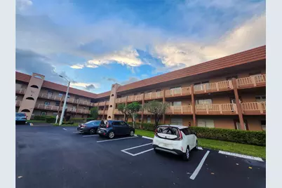 9661 Sunrise Lakes Boulevard #302, Sunrise, FL 33322 - Photo 1