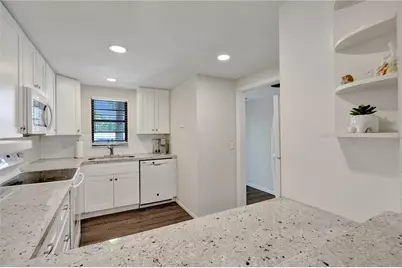 2410 Deer Creek Country Club Boulevard #202, Deerfield Beach, FL 33442 - Photo 1