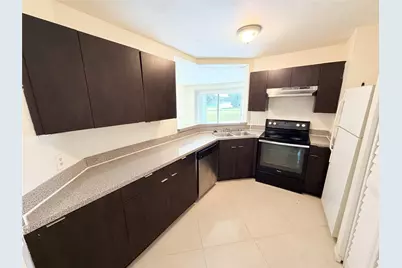 3445 NW 44th Street #102, Lauderdale Lakes, FL 33309 - Photo 1