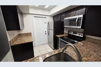 4061 NW 9th Avenue #105, Deerfield Beach, FL 33064 - Photo 1