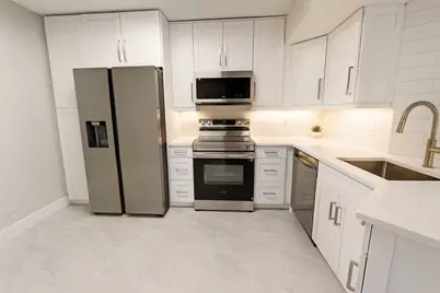 9055 Wiles Road #208, Coral Springs, FL 33067 - Photo 1