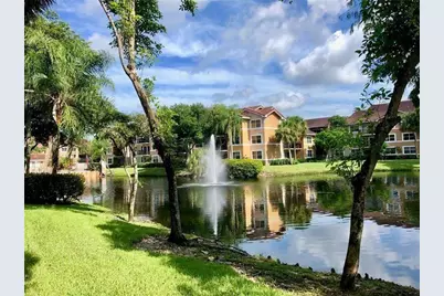 8701 Wiles Road #108, Coral Springs, FL 33067 - Photo 1