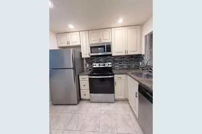 9949 Sandalfoot Boulevard #542, Boca Raton, FL 33428 - Photo 1