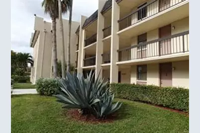 8433 Forest Hills Drive #103, Coral Springs, FL 33065 - Photo 1