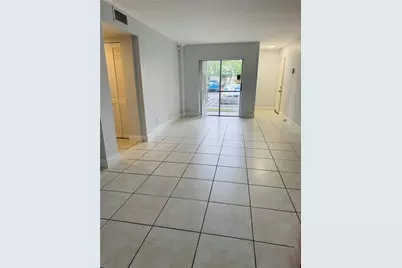 313 Gardens Drive #104, Pompano Beach, FL 33069 - Photo 1