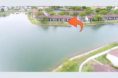 203 Lake Pointe Drive #108, Oakland Park, FL 33309 - Photo 1