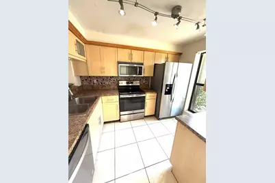 3070 S Oakland Forest Drive #306, Oakland Park, FL 33309 - Photo 1