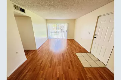 1203 N Benoist Farms Road #206, West Palm Beach, FL 33411 - Photo 1