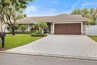 10044 NW 54th Place, Coral Springs, FL 33076 - Photo 1