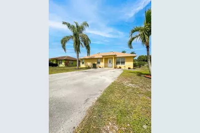 1009 SW Avenue E Place, Belle Glade, FL 33430 - Photo 1