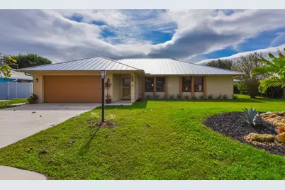 1927 NE San Carlos Calle, Jensen Beach, FL 34957 - Photo 1