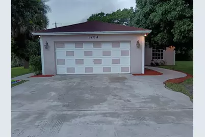 1704 Boardman Avenue, Mangonia Park, FL 33407 - Photo 1