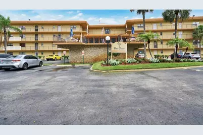 9273 SW 8th Street #209, Boca Raton, FL 33428 - Photo 1