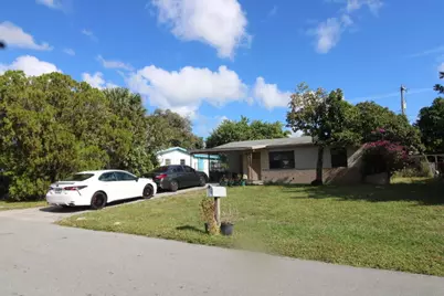 5702 Briarwood Street, Mangonia Park, FL 33407 - Photo 1