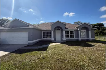 1196 SE Puritan Lane, Port Saint Lucie, FL 34983 - Photo 1