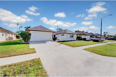 10306 Greentrail Drive N, Boynton Beach, FL 33436 - Photo 1