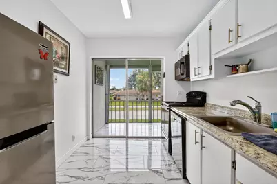 5 Abbey Lane #204, Delray Beach, FL 33446 - Photo 1