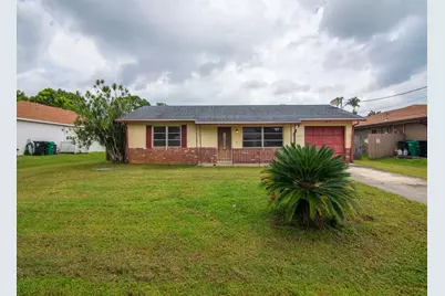 557 SW Duval Avenue, Port Saint Lucie, FL 34983 - Photo 1