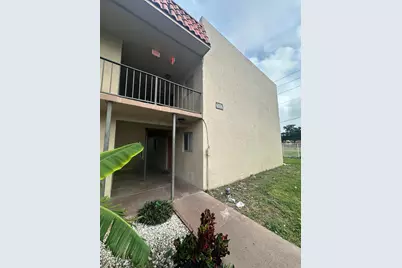 6086 Forest Hill Boulevard #107, West Palm Beach, FL 33415 - Photo 1