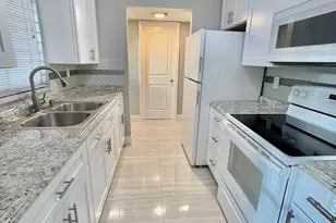 26 Golfs Edge A, West Palm Beach, FL 33417 - Photo 1