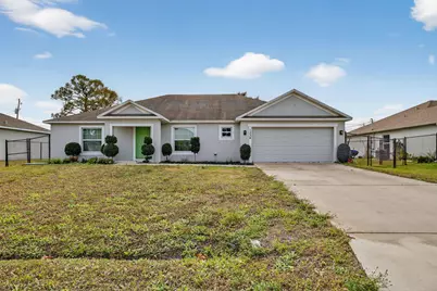 1334 SW Axtell Avenue, Port Saint Lucie, FL 34953 - Photo 1