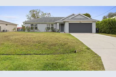 1042 SW Sultan Drive, Port Saint Lucie, FL 34953 - Photo 1