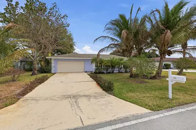 9696 Honeysuckle Avenue, Palm Beach Gardens, FL 33410 - Photo 1