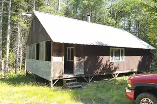 279 E Branch Rd, Seboeis Plantation, ME 04448 - Photo 1