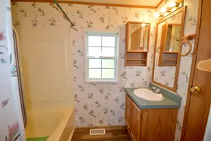 87 Call Rd, Milford, ME 04461 - Photo 11