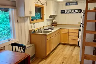 1017 Spurline Rd, Carrabassett Valley, ME 04947 - Photo 9