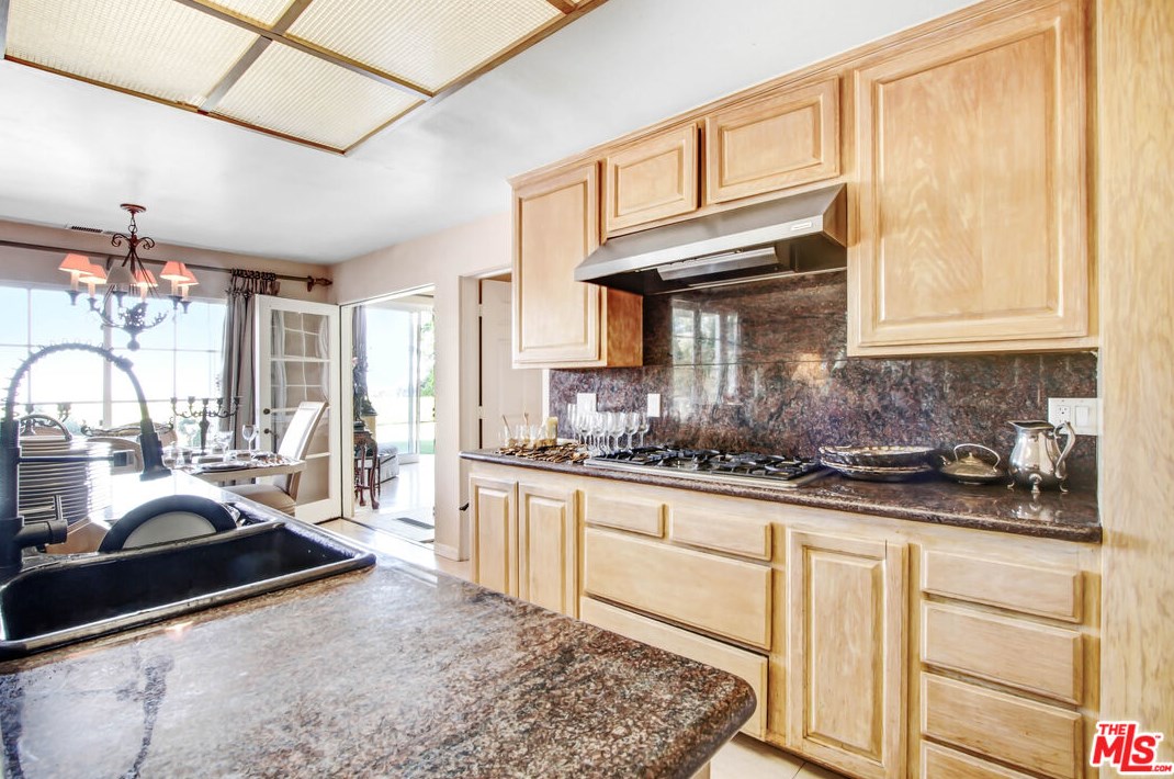 12535 Promontory Rd, Los Angeles CA  90049-6814 exterior