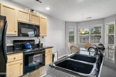 3030 Marsh Winds Circle #Unit 205, Southport, NC 28461 - Photo 11