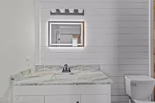 211 NE 55th St, Oak Island, NC 28465 - Photo 29