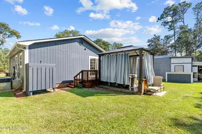 211 NE 55th Street, Oak Island, NC 28465 - Photo 45