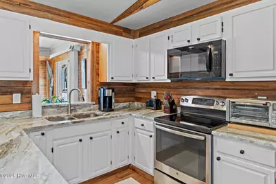 211 NE 55th Street, Oak Island, NC 28465 - Photo 13