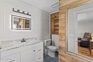 211 NE 55th St, Oak Island, NC 28465 - Photo 27