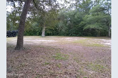 107 SW 28th Street, Oak Island, NC 28465 - Photo 1