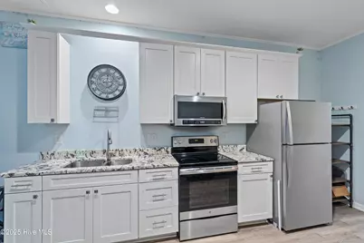304 NE 47th Street, Oak Island, NC 28465 - Photo 19