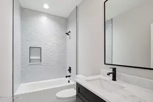 210 NE 57th St, Oak Island, NC 28465 - Photo 25