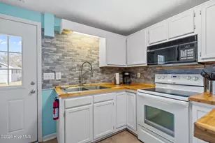321 NE 59th St, Oak Island, NC 28465 - Photo 45