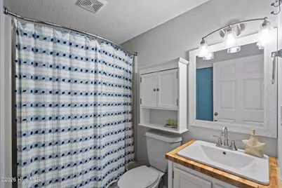 321 NE 59th Street, Oak Island, NC 28465 - Photo 51