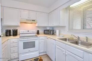 1000 Caswell Beach Rd, Oak Island, NC 28465 - Photo 13
