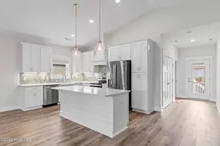 310 NE 58th St, Oak Island, NC 28465 - Photo 11