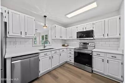 322 NE 57th Street, Oak Island, NC 28465 - Photo 17