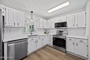 322 NE 57th St, Oak Island, NC 28465 - Photo 17