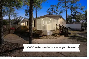 254 NE 69th St, Oak Island, NC 28465 - Photo 1