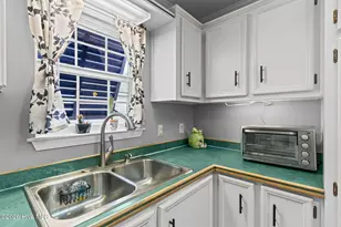 212 NE 33rd St, Oak Island, NC 28465 - Photo 13