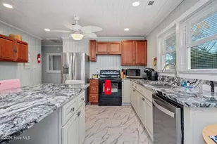 3016 W Beach Dr, Oak Island, NC 28465 - Photo 17