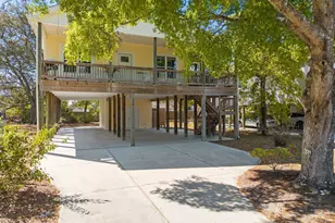 129 NE 8th St, Oak Island, NC 28465 - Photo 1